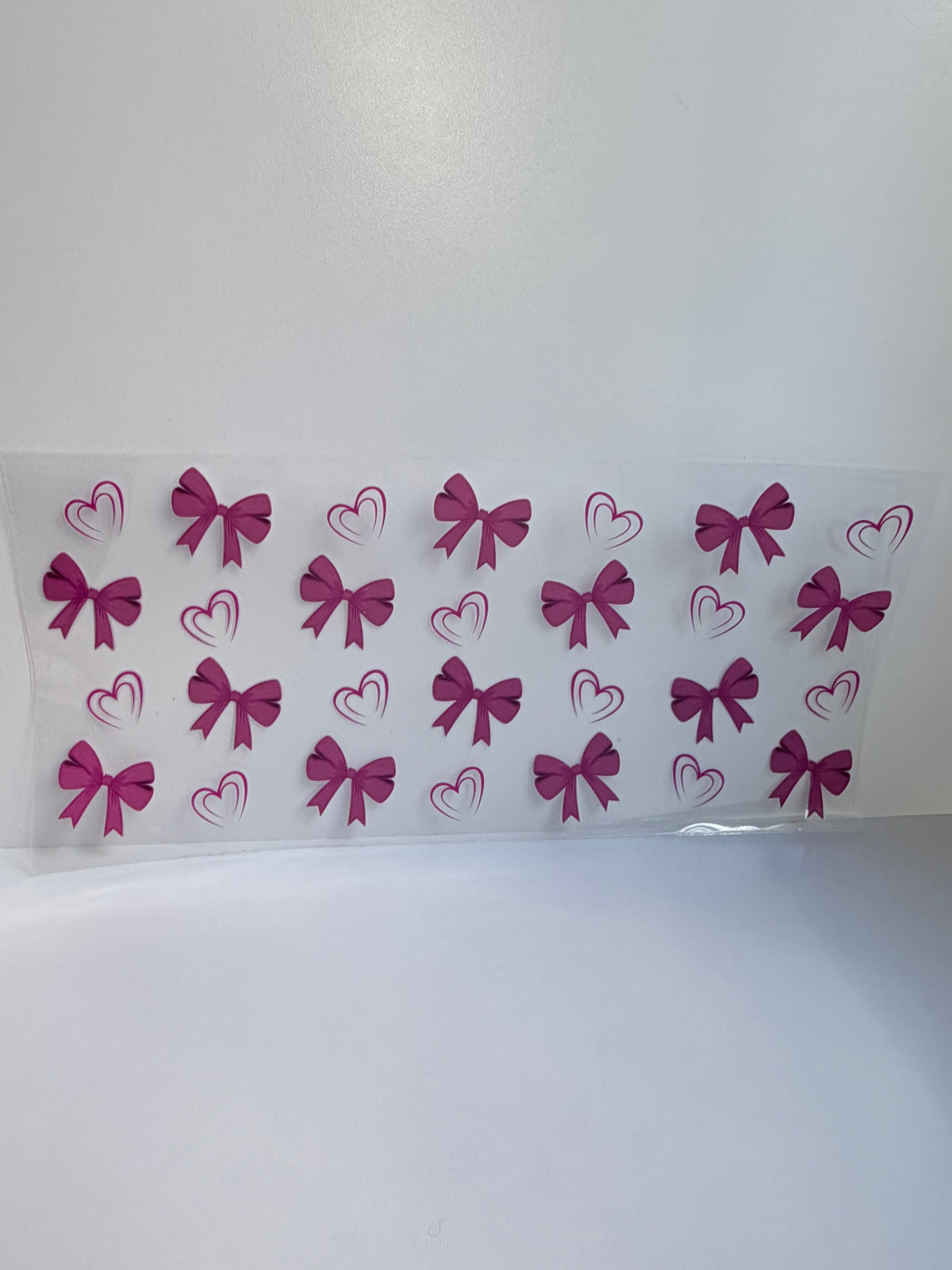 Pink bow and heart